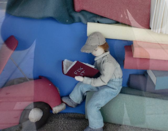 Mechanic with Book